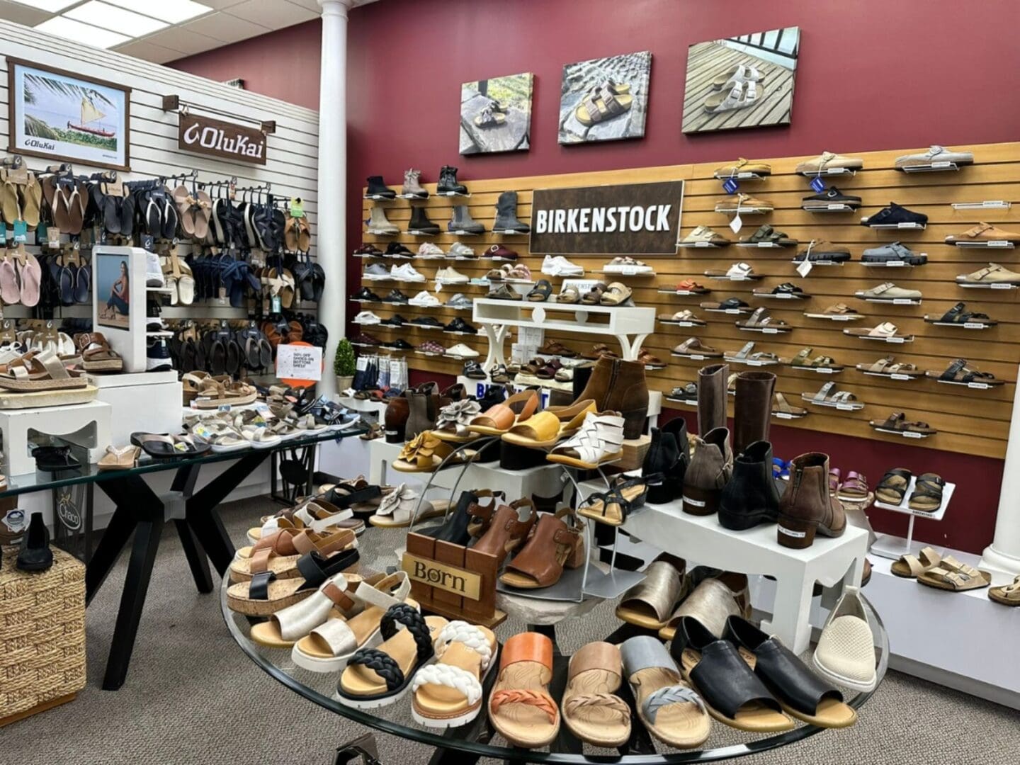 Woman wearing a vibrant floral dress.
